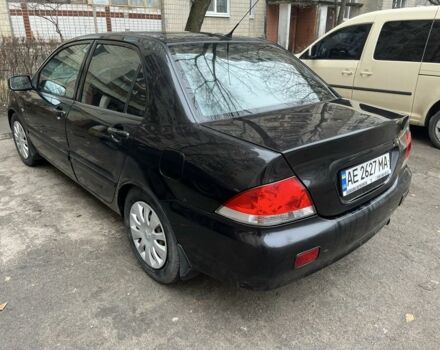 Чорний Міцубісі Lancer, об'ємом двигуна 1.6 л та пробігом 250 тис. км за 3900 $, фото 4 на Automoto.ua