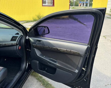Чорний Міцубісі Lancer, об'ємом двигуна 1.5 л та пробігом 210 тис. км за 5500 $, фото 32 на Automoto.ua