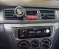Чорний Міцубісі Lancer, об'ємом двигуна 1.58 л та пробігом 323 тис. км за 4500 $, фото 1 на Automoto.ua