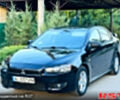 Чорний Міцубісі Lancer, об'ємом двигуна 2 л та пробігом 240 тис. км за 5900 $, фото 1 на Automoto.ua
