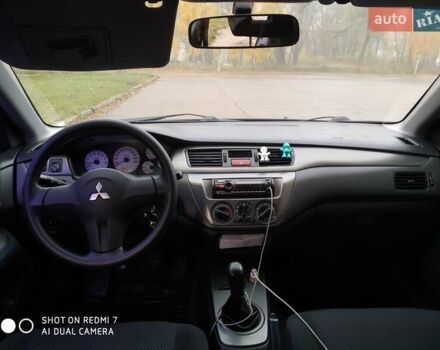 Мицубиси Лансер 2008 в Прилуках на Automoto.ua Черный Мицубиси Лансер, объемом двигателя 1.58 л и пробегом 219 тыс. км за 4900 $, фото 10 на Automoto.ua