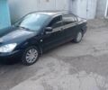 Чорний Міцубісі Lancer, об'ємом двигуна 1.6 л та пробігом 199 тис. км за 3500 $, фото 1 на Automoto.ua