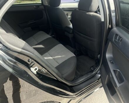 Чорний Міцубісі Lancer, об'ємом двигуна 2 л та пробігом 221 тис. км за 6300 $, фото 6 на Automoto.ua