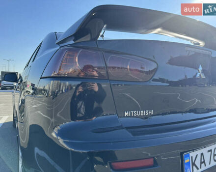Чорний Міцубісі Lancer, об'ємом двигуна 2 л та пробігом 286 тис. км за 6450 $, фото 29 на Automoto.ua
