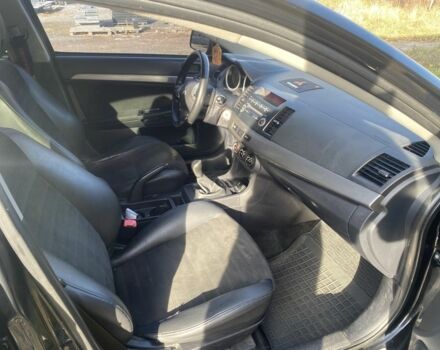 Черный Мицубиси Лансер, объемом двигателя 2 л и пробегом 190 тыс. км за 3100 $, фото 6 на Automoto.ua