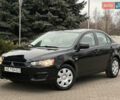 Чорний Міцубісі Lancer, об'ємом двигуна 1.5 л та пробігом 111 тис. км за 6999 $, фото 1 на Automoto.ua