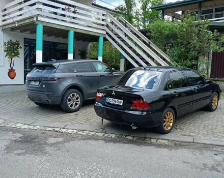 Мицубиси Лансер 2008 в Львове на Automoto.ua Черный Мицубиси Лансер, объемом двигателя 1.58 л и пробегом 200 тыс. км за 5200 $, фото 119 на Automoto.ua
