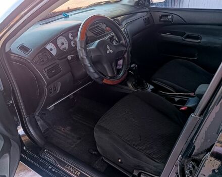 Чорний Міцубісі Lancer, об'ємом двигуна 1.6 л та пробігом 0 тис. км за 4200 $, фото 6 на Automoto.ua