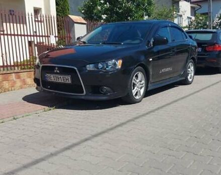 Чорний Міцубісі Lancer, об'ємом двигуна 2 л та пробігом 257 тис. км за 5500 $, фото 1 на Automoto.ua