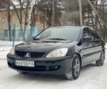 Чорний Міцубісі Lancer, об'ємом двигуна 1.6 л та пробігом 220 тис. км за 5500 $, фото 1 на Automoto.ua
