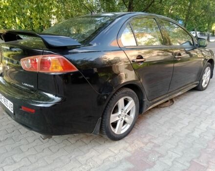 Чорний Міцубісі Lancer, об'ємом двигуна 2 л та пробігом 248 тис. км за 7200 $, фото 3 на Automoto.ua