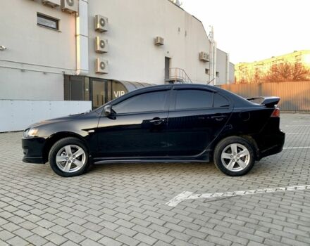 Чорний Міцубісі Lancer, об'ємом двигуна 2 л та пробігом 141 тис. км за 7800 $, фото 4 на Automoto.ua