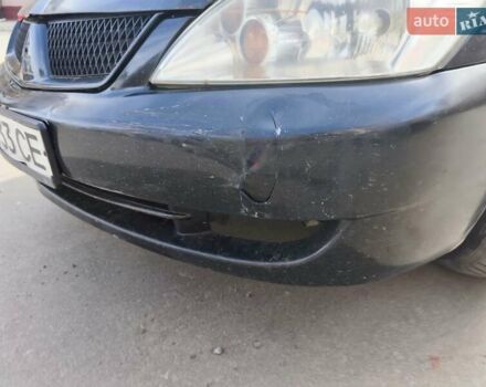 Черный Мицубиси Лансер, объемом двигателя 1.6 л и пробегом 358 тыс. км за 4300 $, фото 10 на Automoto.ua