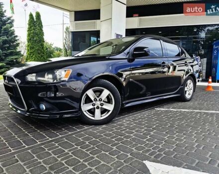 Чорний Міцубісі Lancer, об'ємом двигуна 2 л та пробігом 240 тис. км за 7850 $, фото 13 на Automoto.ua