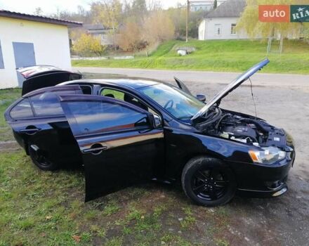 Мицубиси Лансер 2008 в Киеве на Automoto.ua Черный Мицубиси Лансер, объемом двигателя 2 л и пробегом 196 тыс. км за 5500 $, фото 35 на Automoto.ua
