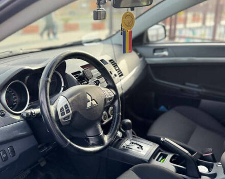 Черный Мицубиси Лансер, объемом двигателя 2 л и пробегом 104 тыс. км за 7600 $, фото 7 на Automoto.ua