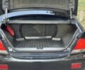 Чорний Міцубісі Lancer, об'ємом двигуна 1.6 л та пробігом 300 тис. км за 4600 $, фото 21 на Automoto.ua