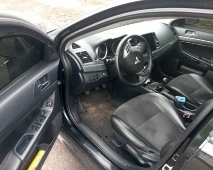 Чорний Міцубісі Lancer, об'ємом двигуна 2 л та пробігом 232 тис. км за 5000 $, фото 1 на Automoto.ua