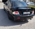 Чорний Міцубісі Lancer, об'ємом двигуна 1.6 л та пробігом 277 тис. км за 4900 $, фото 3 на Automoto.ua