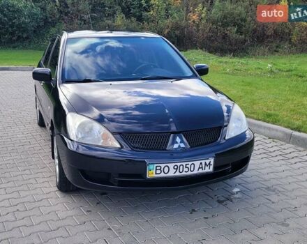 Міцубісі Lancer 2008 у Тернополі на Automoto.ua Чорний Міцубісі Lancer, об'ємом двигуна 1.58 л та пробігом 182 тис. км за 5600 $, фото 9 на Automoto.ua
