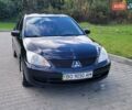 Міцубісі Lancer 2008 у Тернополі на Automoto.ua Чорний Міцубісі Lancer, об'ємом двигуна 1.58 л та пробігом 182 тис. км за 5600 $, фото 9 на Automoto.ua