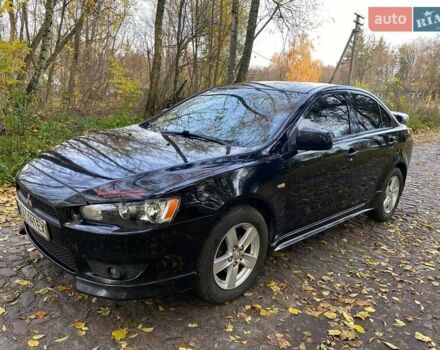 Чорний Міцубісі Lancer, об'ємом двигуна 2 л та пробігом 237 тис. км за 7500 $, фото 10 на Automoto.ua
