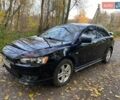 Чорний Міцубісі Lancer, об'ємом двигуна 2 л та пробігом 237 тис. км за 7500 $, фото 10 на Automoto.ua