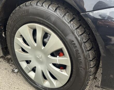 Черный Мицубиси Лансер, объемом двигателя 1.6 л и пробегом 1 тыс. км за 3750 $, фото 6 на Automoto.ua