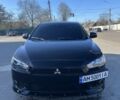 Чорний Міцубісі Lancer, об'ємом двигуна 2 л та пробігом 3 тис. км за 6400 $, фото 1 на Automoto.ua