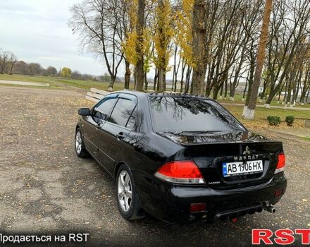 Чорний Міцубісі Lancer, об'ємом двигуна 1.6 л та пробігом 1 тис. км за 5300 $, фото 3 на Automoto.ua