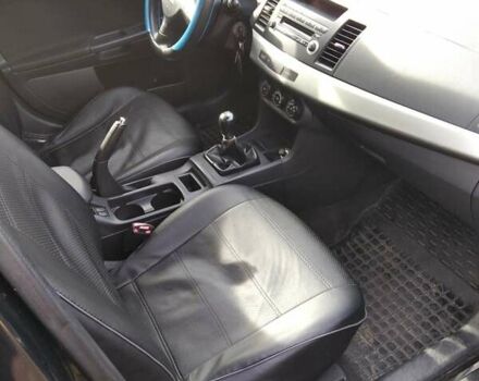 Черный Мицубиси Лансер, объемом двигателя 1.5 л и пробегом 219 тыс. км за 6000 $, фото 8 на Automoto.ua