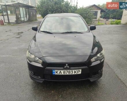 Черный Мицубиси Лансер, объемом двигателя 2 л и пробегом 229 тыс. км за 7300 $, фото 7 на Automoto.ua