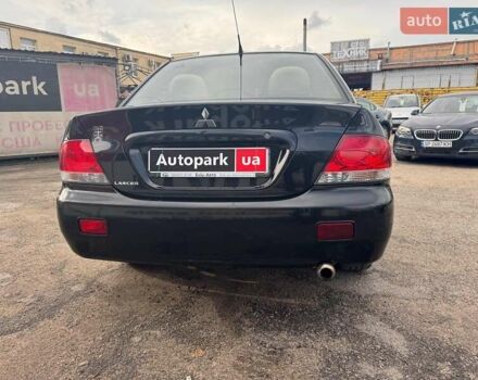 Мицубиси Лансер 2008 в Запорожье на Automoto.ua Черный Мицубиси Лансер, объемом двигателя 1.6 л и пробегом 316 тыс. км за 4290 $, фото 1 на Automoto.ua