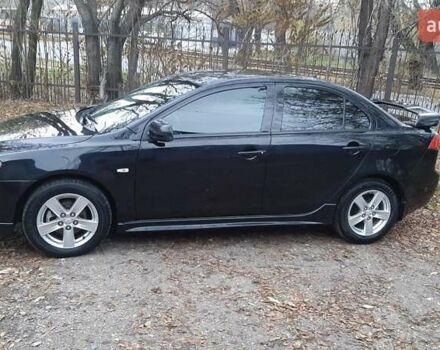 Черный Мицубиси Лансер, объемом двигателя 2 л и пробегом 63 тыс. км за 8000 $, фото 9 на Automoto.ua