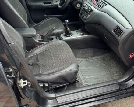 Чорний Міцубісі Lancer, об'ємом двигуна 1.6 л та пробігом 220 тис. км за 3600 $, фото 9 на Automoto.ua