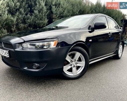 Чорний Міцубісі Lancer, об'ємом двигуна 2 л та пробігом 217 тис. км за 5800 $, фото 1 на Automoto.ua