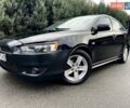 Чорний Міцубісі Lancer, об'ємом двигуна 2 л та пробігом 217 тис. км за 5800 $, фото 1 на Automoto.ua