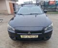 Чорний Міцубісі Lancer, об'ємом двигуна 2 л та пробігом 300 тис. км за 6000 $, фото 3 на Automoto.ua