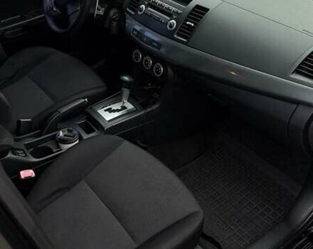 Черный Мицубиси Лансер, объемом двигателя 2 л и пробегом 222 тыс. км за 6000 $, фото 7 на Automoto.ua