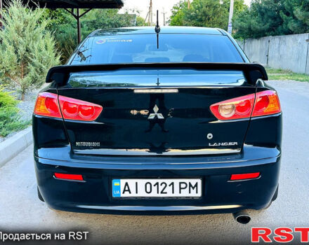 Чорний Міцубісі Lancer, об'ємом двигуна 2 л та пробігом 240 тис. км за 5900 $, фото 4 на Automoto.ua