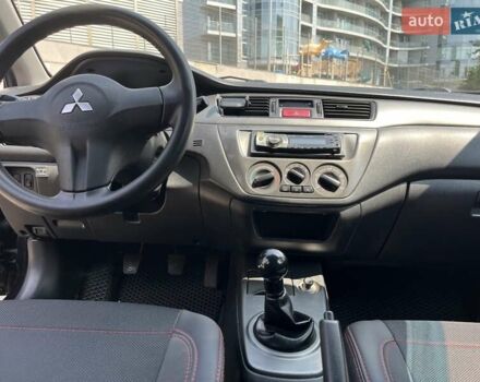 Чорний Міцубісі Lancer, об'ємом двигуна 1.6 л та пробігом 296 тис. км за 4200 $, фото 35 на Automoto.ua