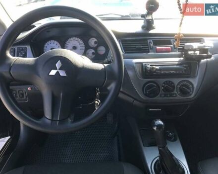 Мицубиси Лансер 2008 в Львове на Automoto.ua Черный Мицубиси Лансер, объемом двигателя 1.6 л и пробегом 356 тыс. км за 4590 $, фото 3 на Automoto.ua
