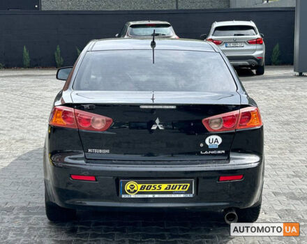 Черный Мицубиси Лансер, объемом двигателя 1.5 л и пробегом 93 тыс. км за 7000 $, фото 4 на Automoto.ua