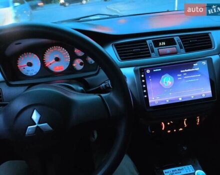 Мицубиси Лансер 2008 в Львове на Automoto.ua Черный Мицубиси Лансер, объемом двигателя 1.58 л и пробегом 200 тыс. км за 5200 $, фото 108 на Automoto.ua