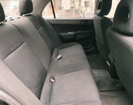 Черный Мицубиси Лансер, объемом двигателя 1.6 л и пробегом 270 тыс. км за 3800 $, фото 6 на Automoto.ua