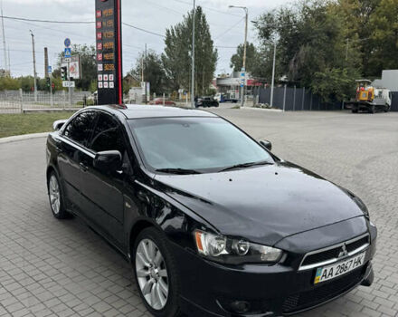 Чорний Міцубісі Lancer, об'ємом двигуна 2 л та пробігом 200 тис. км за 6800 $, фото 1 на Automoto.ua