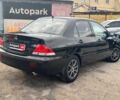 Мицубиси Лансер 2008 в Запорожье на Automoto.ua Черный Мицубиси Лансер, объемом двигателя 1.6 л и пробегом 316 тыс. км за 4290 $, фото 6 на Automoto.ua