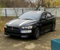 Черный Мицубиси Лансер, объемом двигателя 2 л и пробегом 160 тыс. км за 8000 $, фото 5 на Automoto.ua