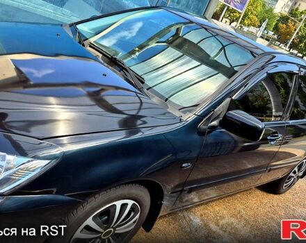 Черный Мицубиси Лансер, объемом двигателя 1.6 л и пробегом 205 тыс. км за 5500 $, фото 2 на Automoto.ua