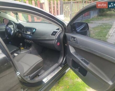 Чорний Міцубісі Lancer, об'ємом двигуна 2 л та пробігом 183 тис. км за 5000 $, фото 11 на Automoto.ua